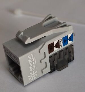 Jack para cableado de red RJ45 UTP categoría 6A, color gris, 90 grados